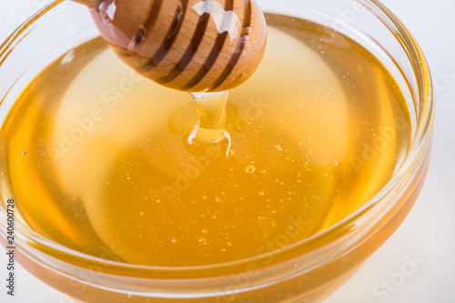 Closeup of fresh honey in glass bowl
