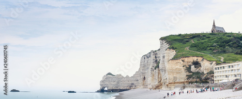 France, Upper Normandy, Seine-Maritime, Etretat, panoramic view of cliff Falaise d'Amont and church Notre Dame de la Garde photo