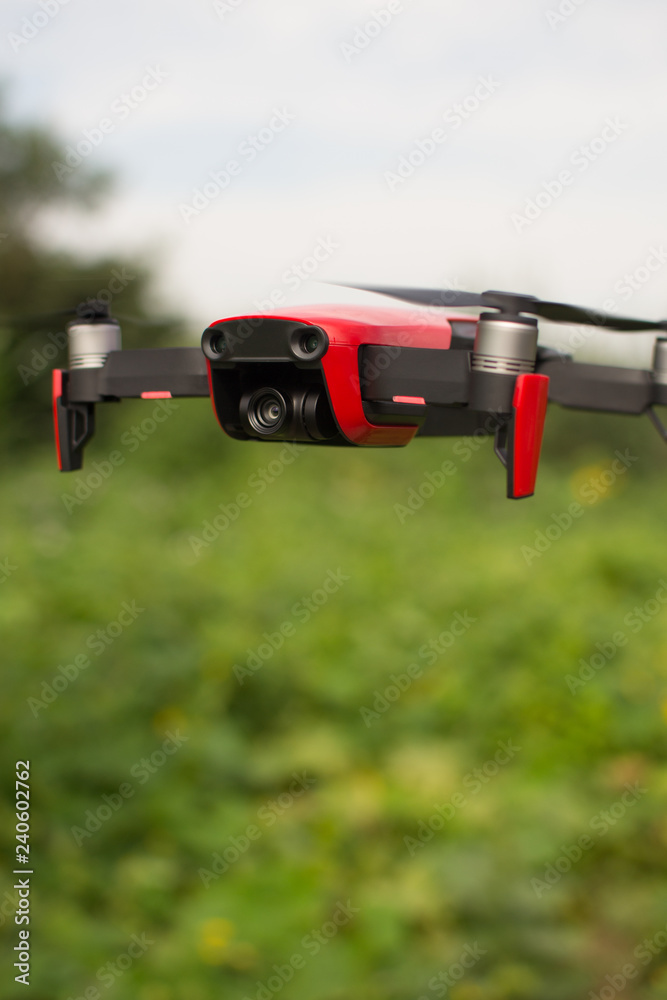 Red drone flying