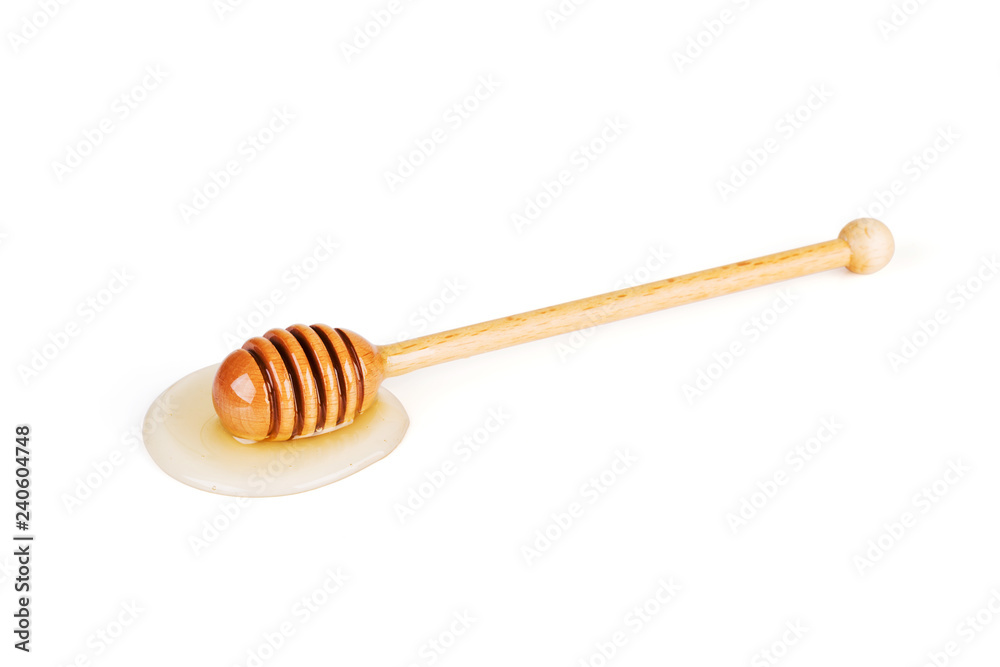 Honey and honey dipper on white background Honey and honey dipper on white background