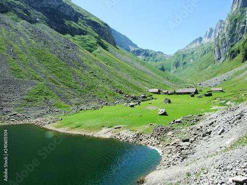 Alpine lake Fahlensee in mountain range Alpstein - Canton of Appenzell Innerrhoden, Switzerland photo