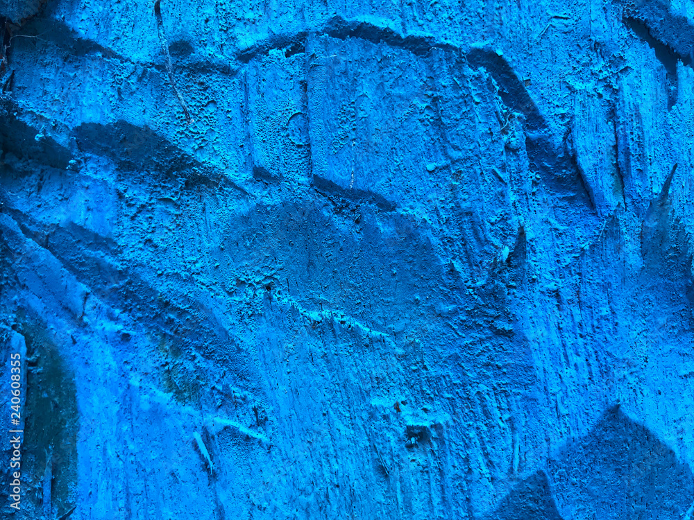 Blue background. Rough surface.
