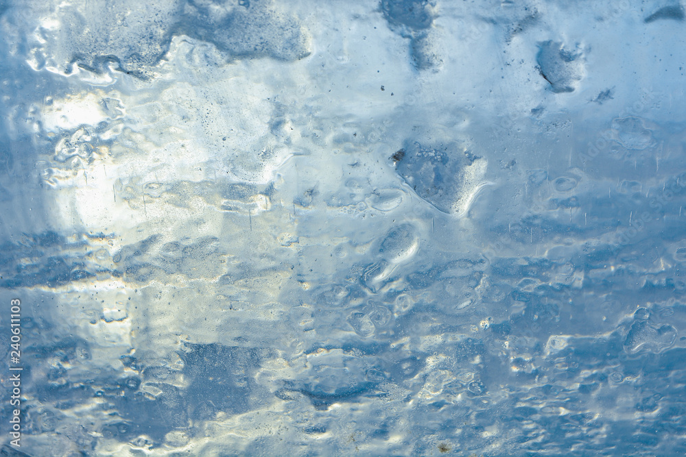 The texture of the ice. The frozen water.Winter background 