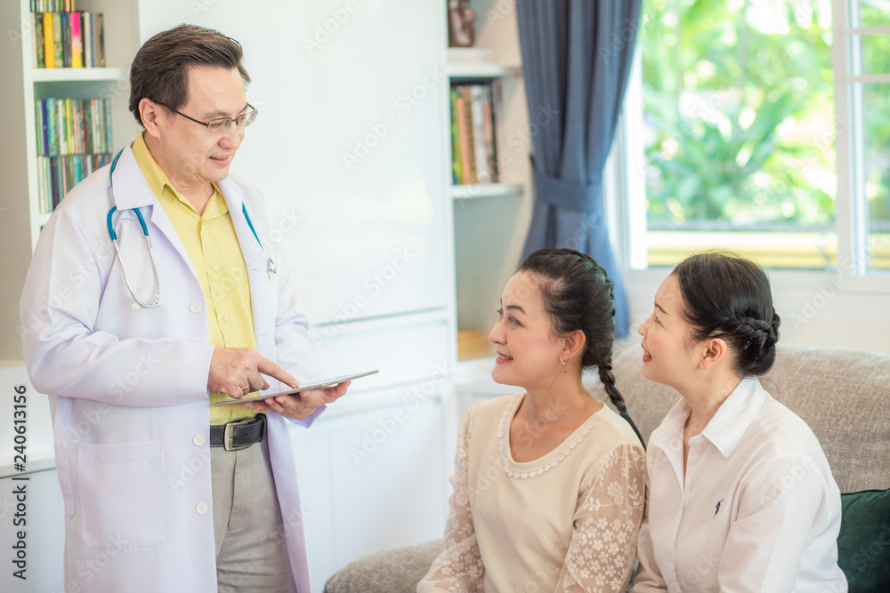 Healthcare consultation concept of doctor talking with middle age asian women Healthcare consultation concept of doctor talking with middle age asian women