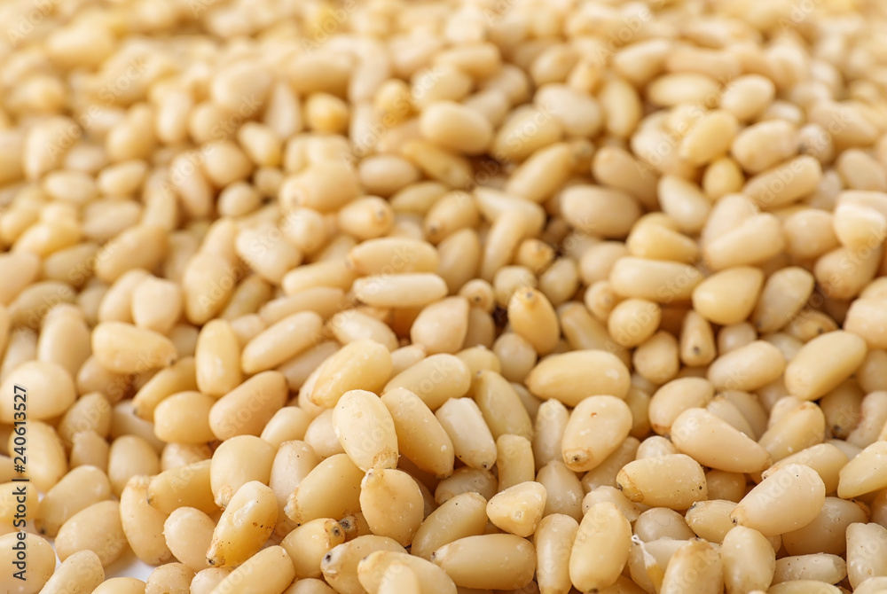 Pile of pine nuts as background, closeup Pile of pine nuts as background, closeup