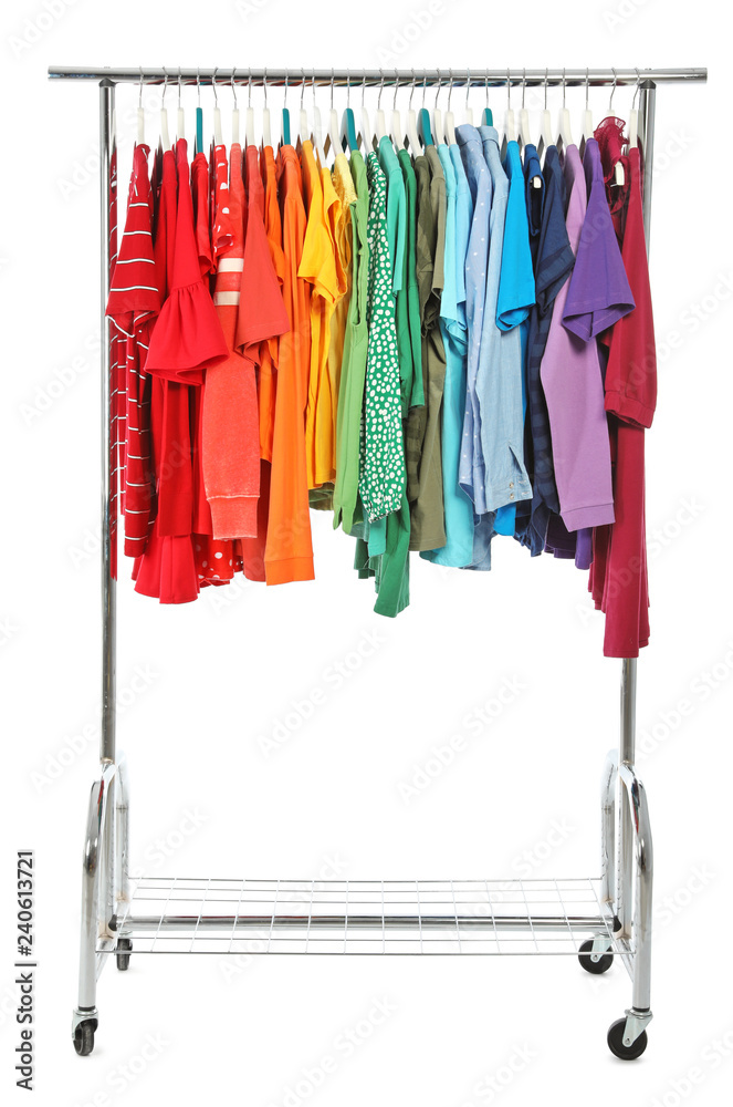 Obraz premium Wardrobe rack with different colorful clothes on white background