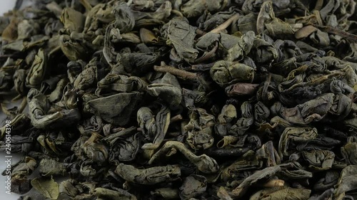 Tea herbs texture. Green tea. Organic dried green tea leaves. photo