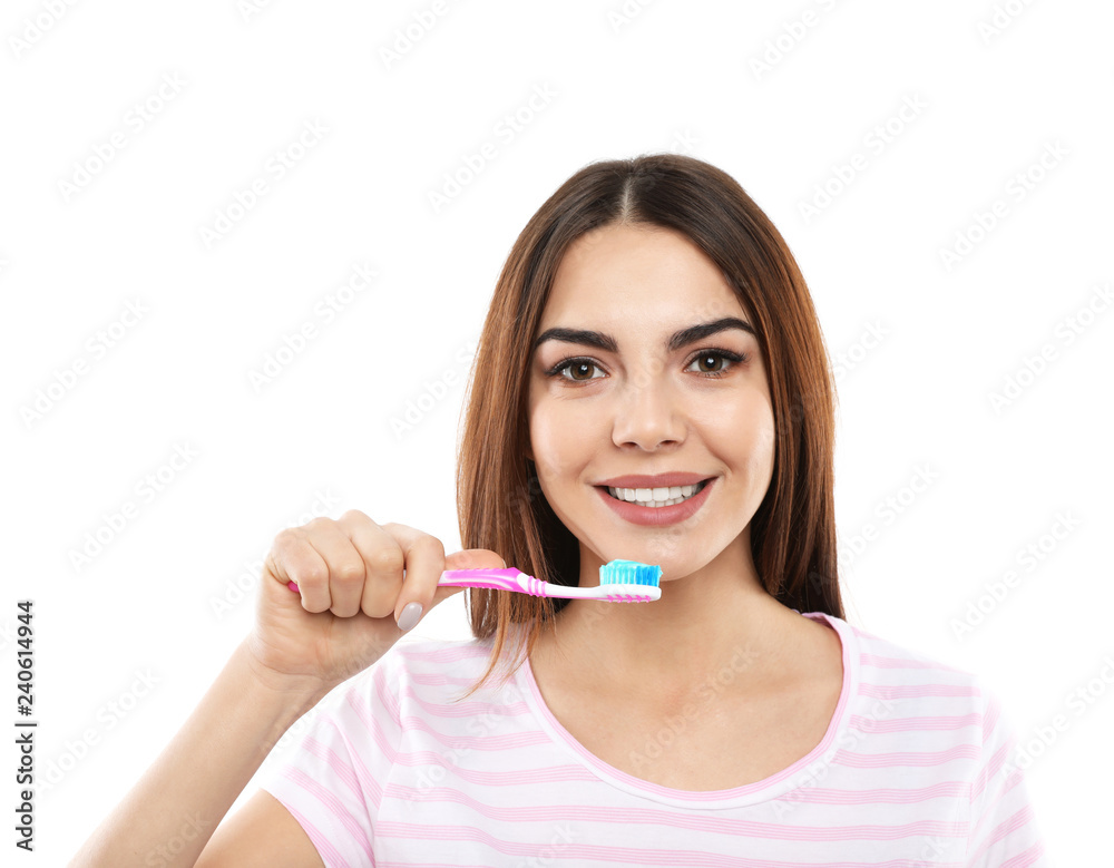 Beautiful woman brushing teeth on white background Beautiful woman brushing teeth on white background