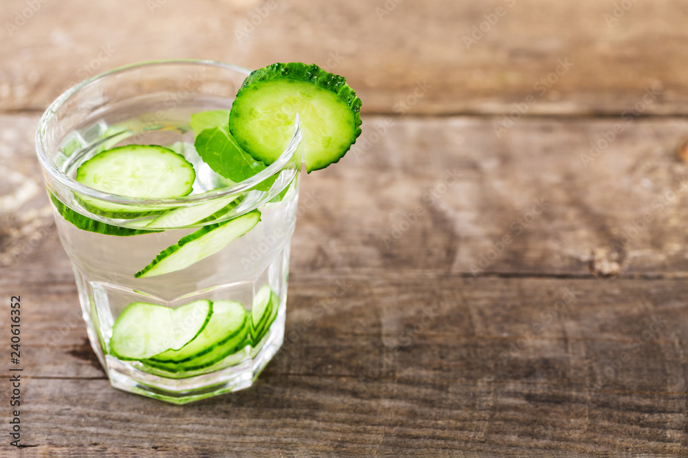 A cup of cucumber water. Handmade A cup of cucumber water. Handmade