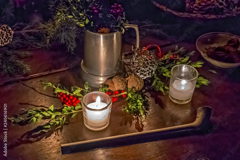 Traditional Festive New Year Table Setting with Candles and Pipe Traditional Festive New Year Table Setting with Candles and Pipe