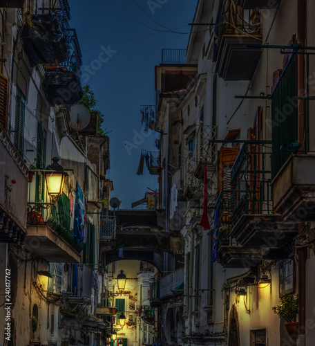 Narrow alley in world famous old town Amalfi at night