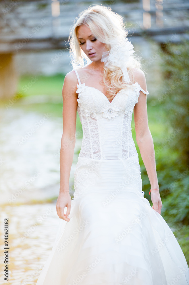 Beautiful bride in sunset rays Beautiful bride in sunset rays