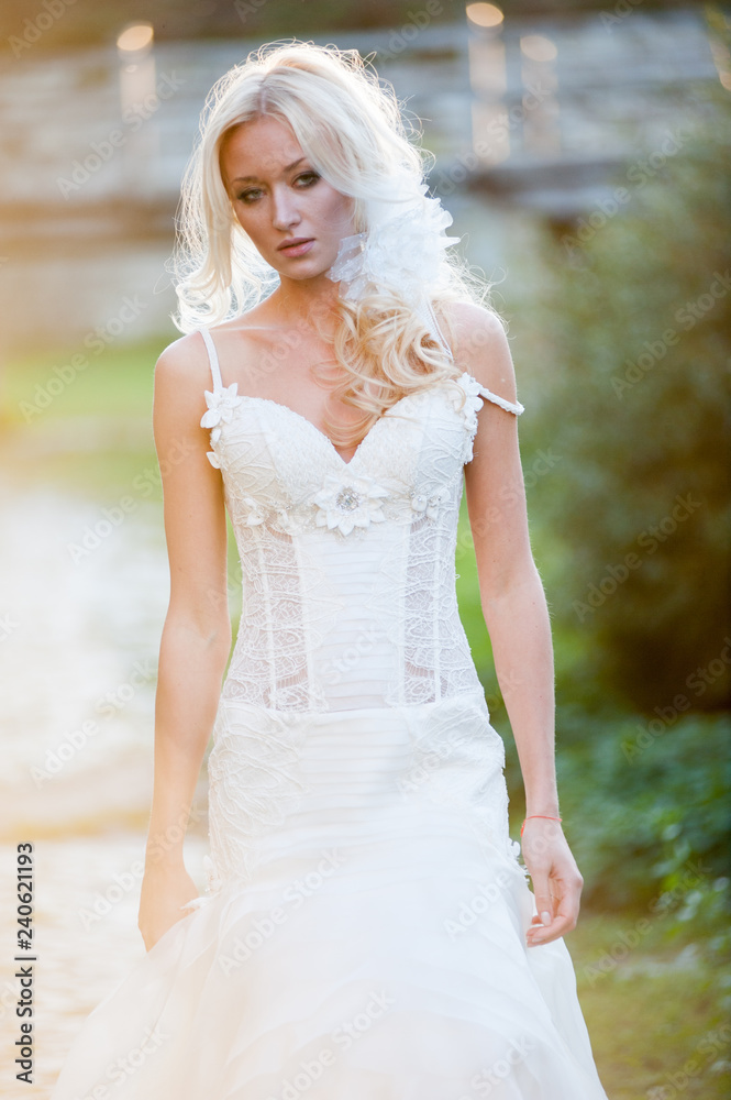 Beautiful bride in sunset rays Beautiful bride in sunset rays