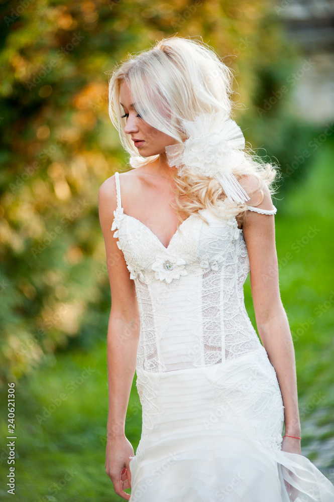 Beautiful bride in sunset rays Beautiful bride in sunset rays