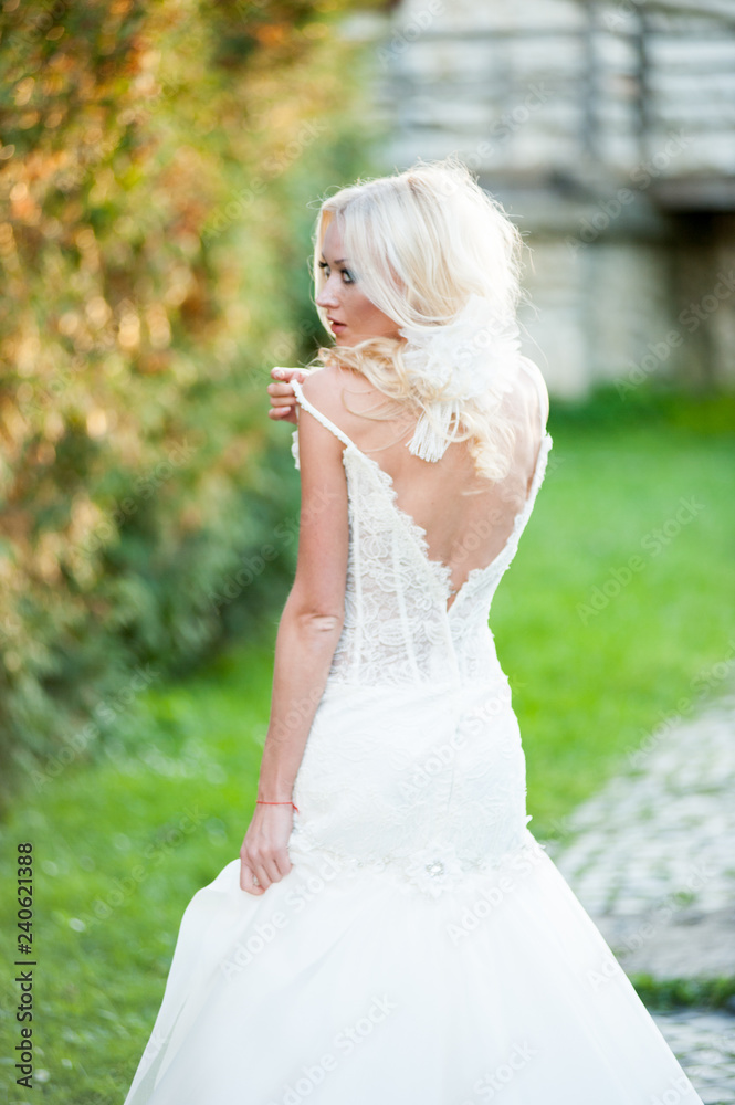 Beautiful bride in sunset rays Beautiful bride in sunset rays
