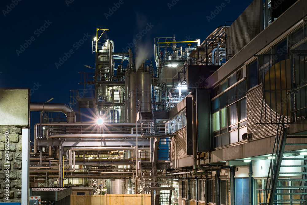Detailed view of a chemical plant at night. Work at night. Urban landscape in Gouda, The Netherlands.