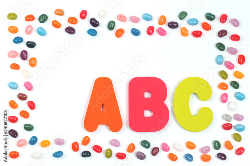 Jelly bean sweets and ABC letters. Education and alphabet at school concept