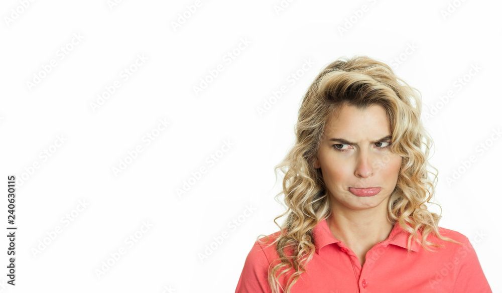 Young beautiful emotional girl rejoices and shouts on a white isolated background.