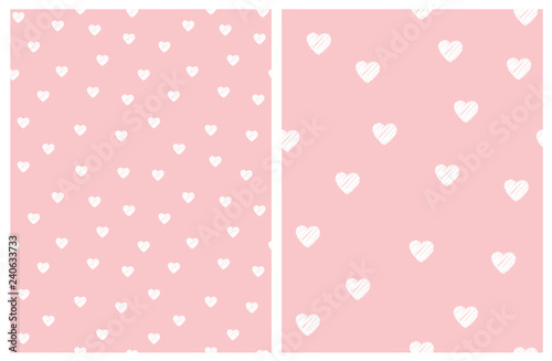 Cute White Hearts Vector Patterns. White Sketched Hearts on a Light Pink Background. Simple Infantile Style Design. Set of 2 Valentine Vector Layouts.