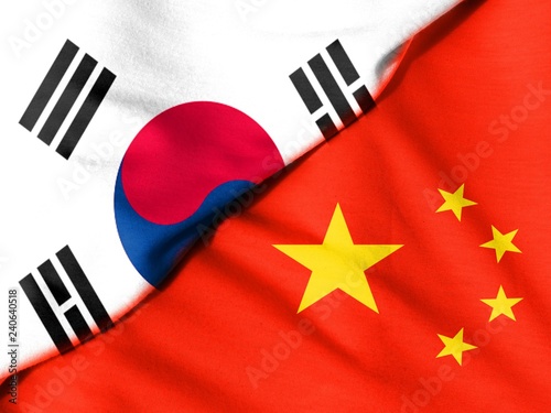 Crumpled flags. Flag of the People's Republic of China. Flag of South Korea.