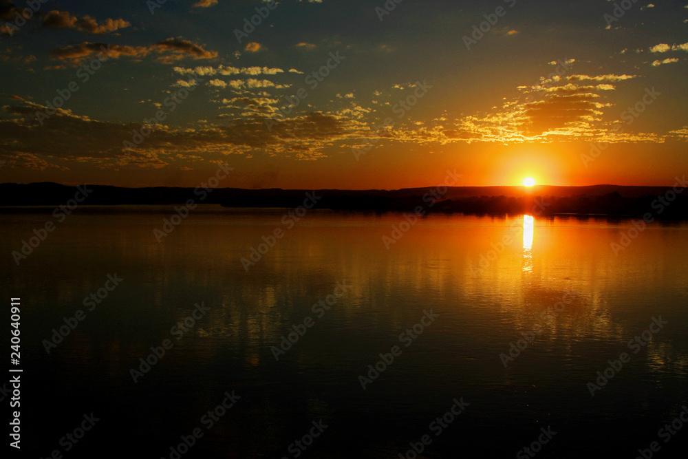 Obraz premium Sunset with reflection in the river.jpg, Sunset on the São Francisco River in Minas Gerais
