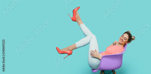woman wearing living coral color high heel, trendy high heel