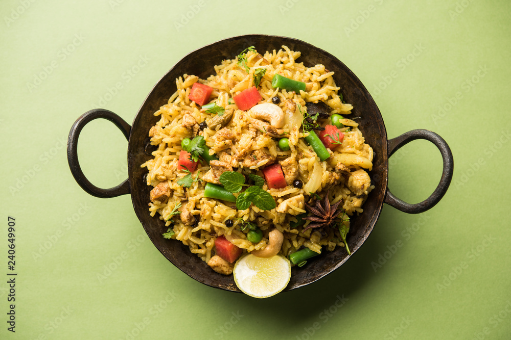 Kheema Pulao - Rice cooked with mutton or chicken mince with vegetables and spices. served in a bowl. selective focus Kheema Pulao - Rice cooked with mutton or chicken mince with vegetables and spices. served in a bowl. selective focus