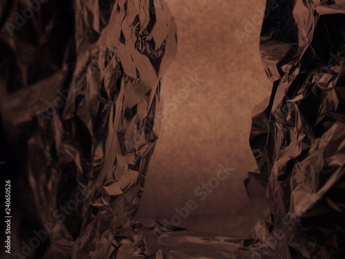 Passage between two rocks. Fantastic landscape of crumpled aluminum foil.