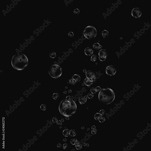 White air bubbles isolated on black background. Underwater oxygen. Soap closeup.
