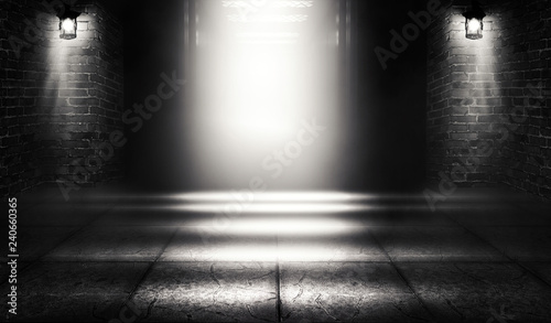 Background of an empty building with brick walls, illuminated by spotlights. View of open elevator doors. Neon light smoke.