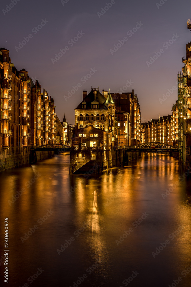 Fototapeta premium The Hamburg Warehouse District (Speicherstadt) is the world's largest historic warehouse complex, located in the Port of Hamburg, Germany. Concept: travel or sights