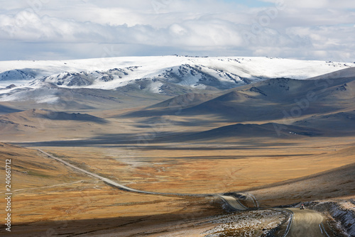 Gravel road across Mongolia steppe, off-road