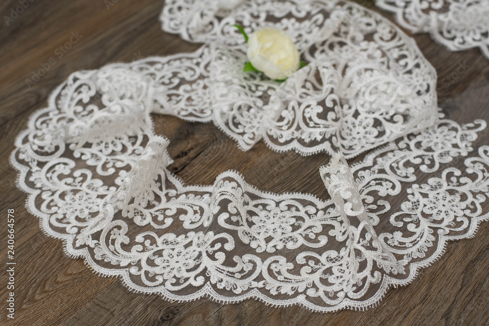 Obraz premium a background image of ivory-colored lace cloth
