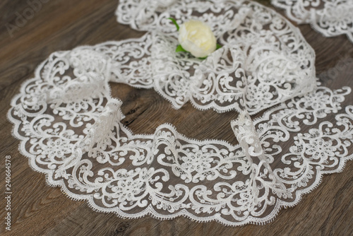 Fototapeta Naklejka Na Ścianę i Meble -  a background image of ivory-colored lace cloth