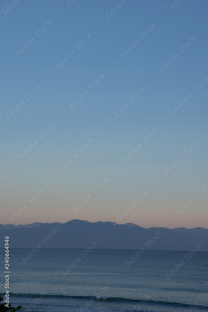 Views of Bucerias Bay at Dusk with the setting sun near Punta de Mita, Mexico