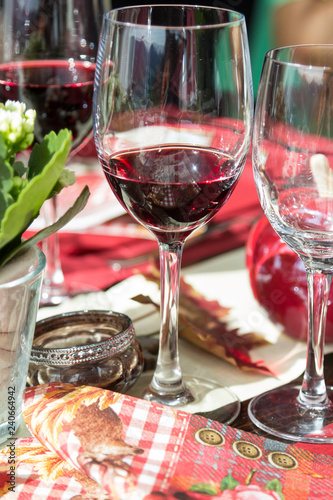 Red wine glass on the dining table