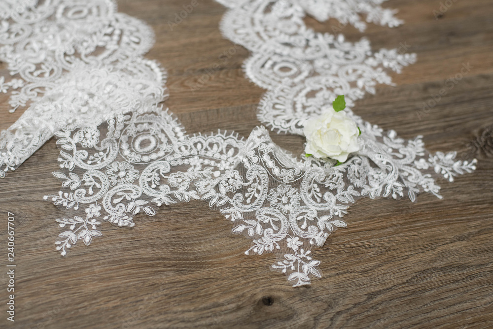 Fototapeta premium Beautiful delicate white lace woven in circles