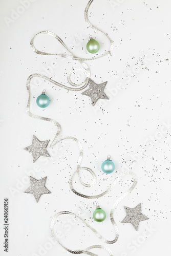 Christmas composition. Christmas balls, pink and silver decorations on white background. Flat lay, top view, copy space