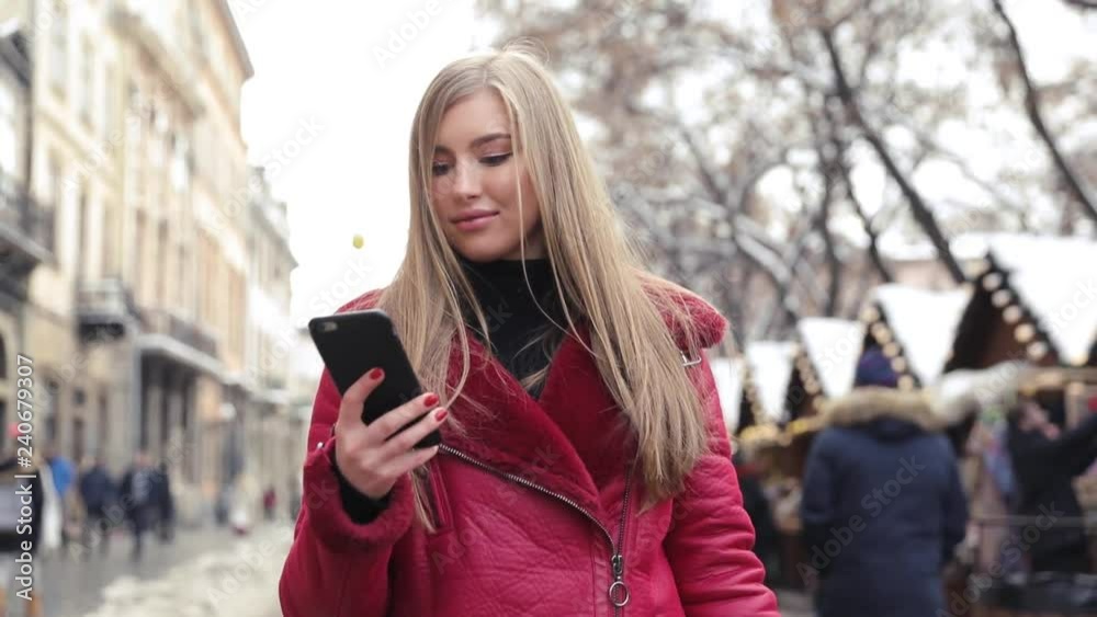 Beautiful girls makes picture in european city. Beautiful girls makes picture in european city.