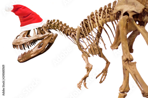 Dinosaur skeleton with Christmas hat on white isolated