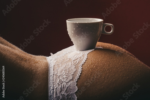 Morning. Sexy coffee. A cup of coffee on the naked female buttocks. Sexy ass. A young girl drinks coffee. Service. Lingerie. Morning shower. Ceramics plumbing