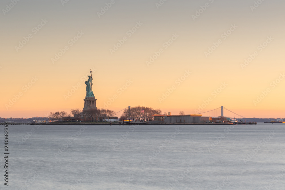 View on Statue of liberty From hudson river at sunset 