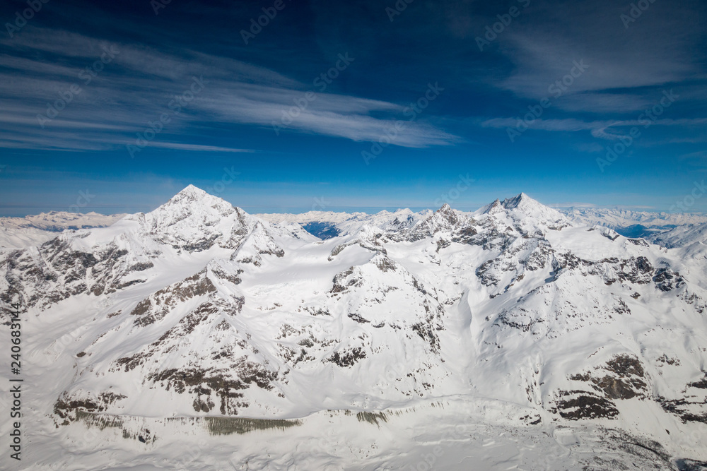 Aerial view of Dent Blanche mountain (left) and Weisshorn mountain (right) in the Swiss alps 
