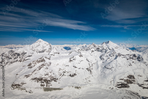 Aerial view of Dent Blanche mountain  left  and Weisshorn mountain  right  in the Swiss alps 