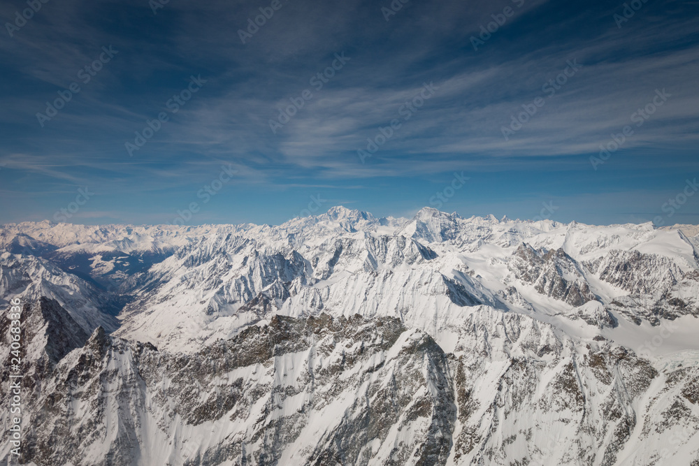 Aerial view of landscape in the Italian and French alps with Mont Blanc .