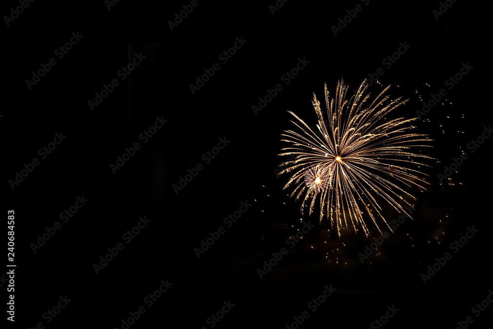 Golden fireworks with copy space