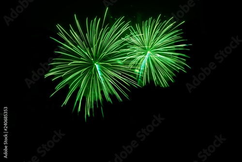 Green fireworks with copy space