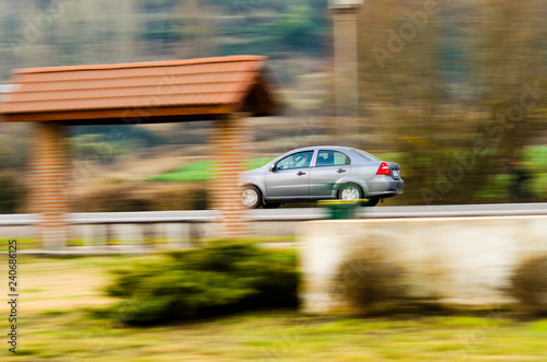 automobile moving at high speed by rural road