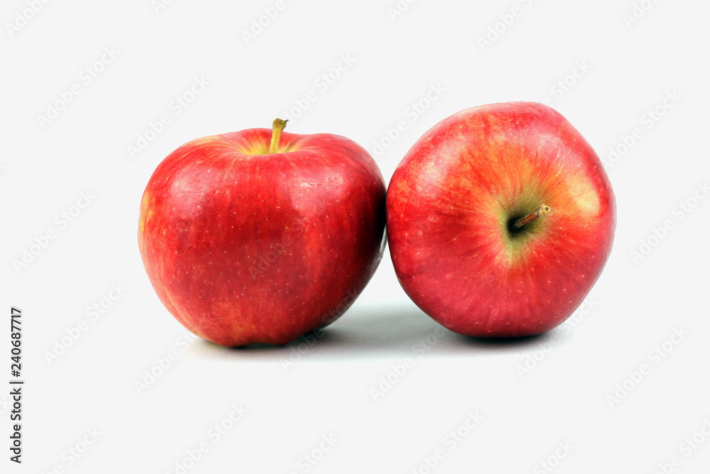 two red apples on white background two red apples on white background