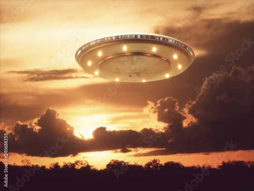 Photography Unidentified flying object, UFO with the sunset in the background